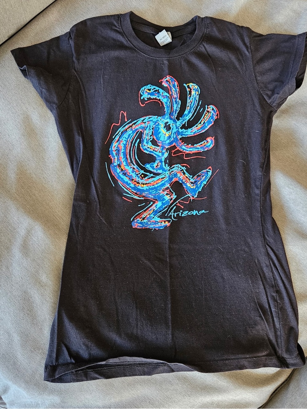 Black Graphic Kokopelli Tee with Neon Blue & Red Design